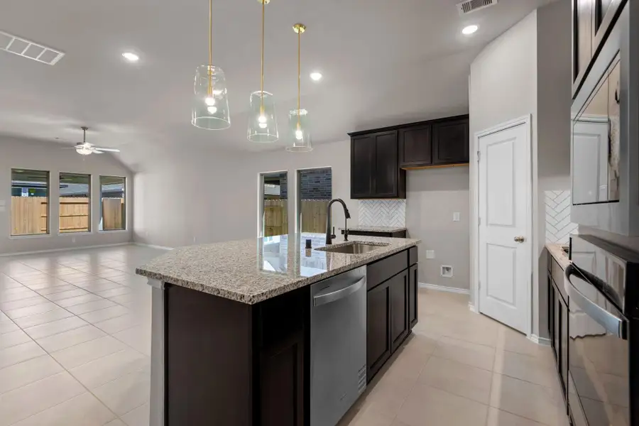 Furnished interior view inside a new home in Grand Central Park, Conroe (Image 6).