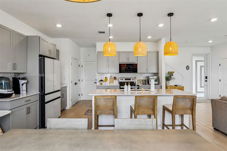Furnished interior view inside a new home in Messina Place, Homestead (Image 6).