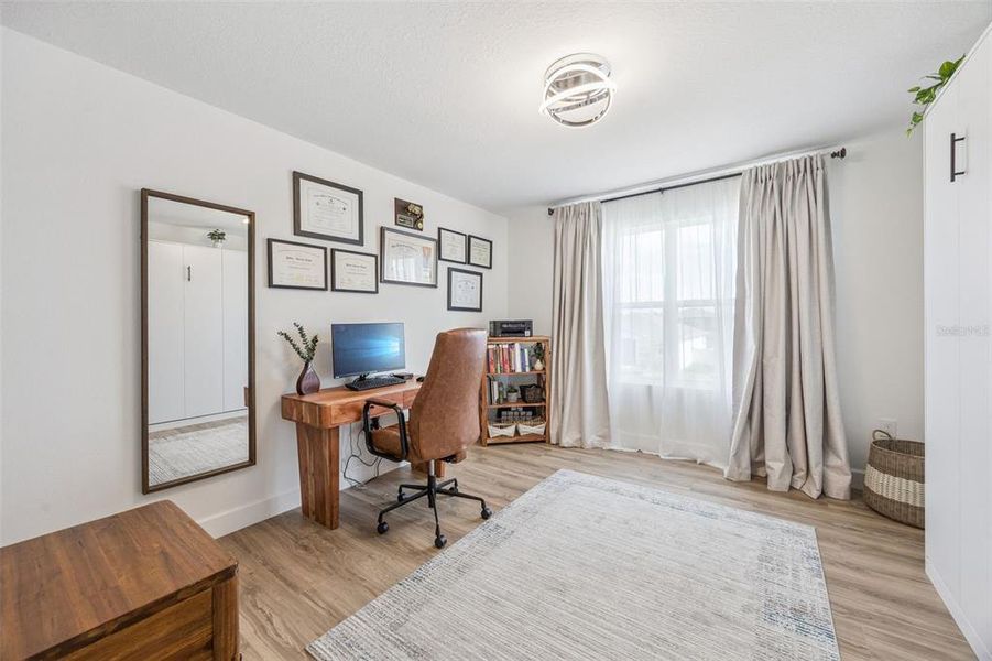 Furnished interior view inside a new home in Waterbrooke, Clermont (Image 35).