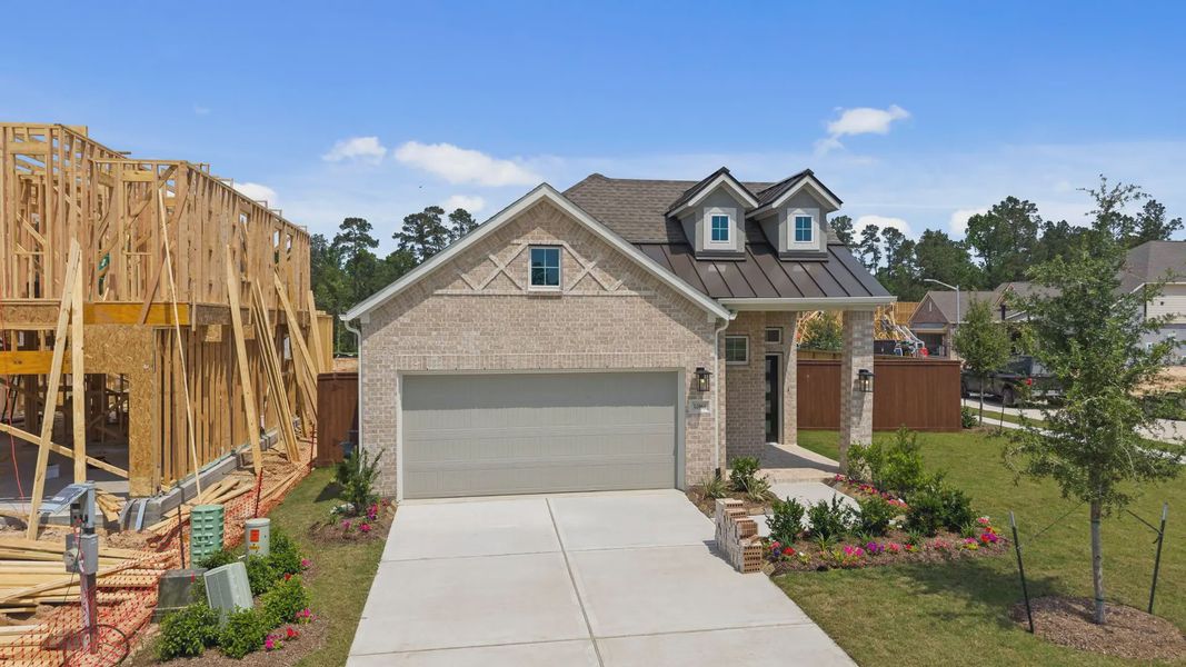 Front exterior of a new home in Evergreen 40s, Conroe, TX, highlighting curb appeal (Image 17). Front exterior of a new home in Evergreen 40s, Conroe, TX, highlighting curb appeal (Image 17).