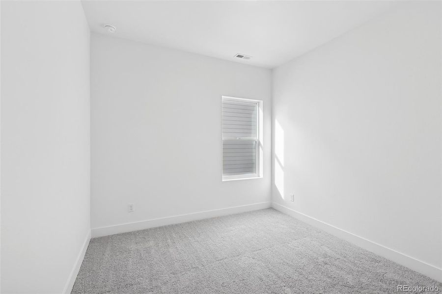 Spacious, unfurnished interior of a new home in Painted Prairie Cottage, Aurora (Image 18).