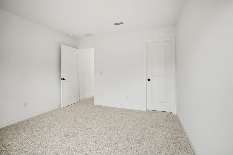 Spacious, unfurnished interior of a new home in Forest Creek, Waxhaw (Image 70).