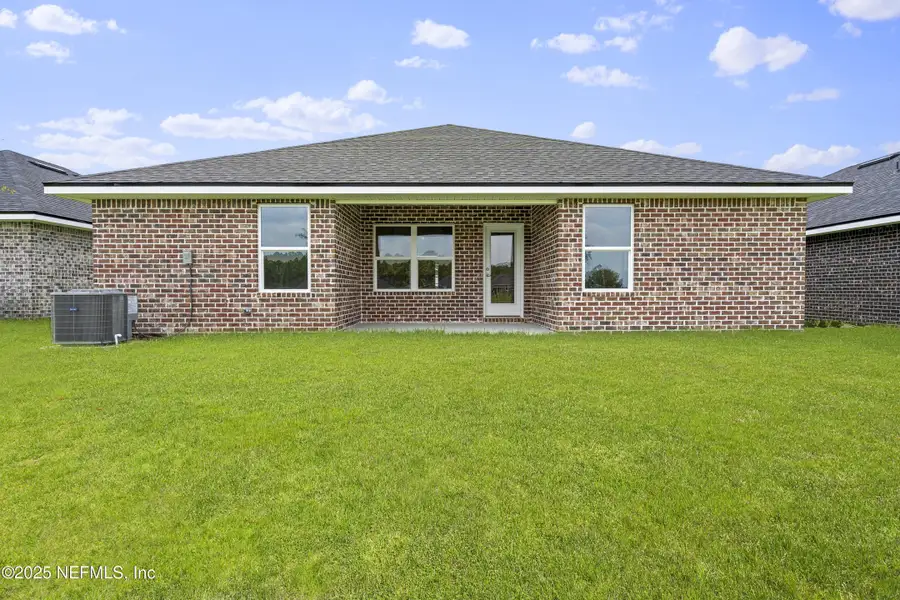Front exterior of a new home in , Green Cove Springs, FL, highlighting curb appeal (Image 2). Front exterior of a new home in , Green Cove Springs, FL, highlighting curb appeal (Image 2).
