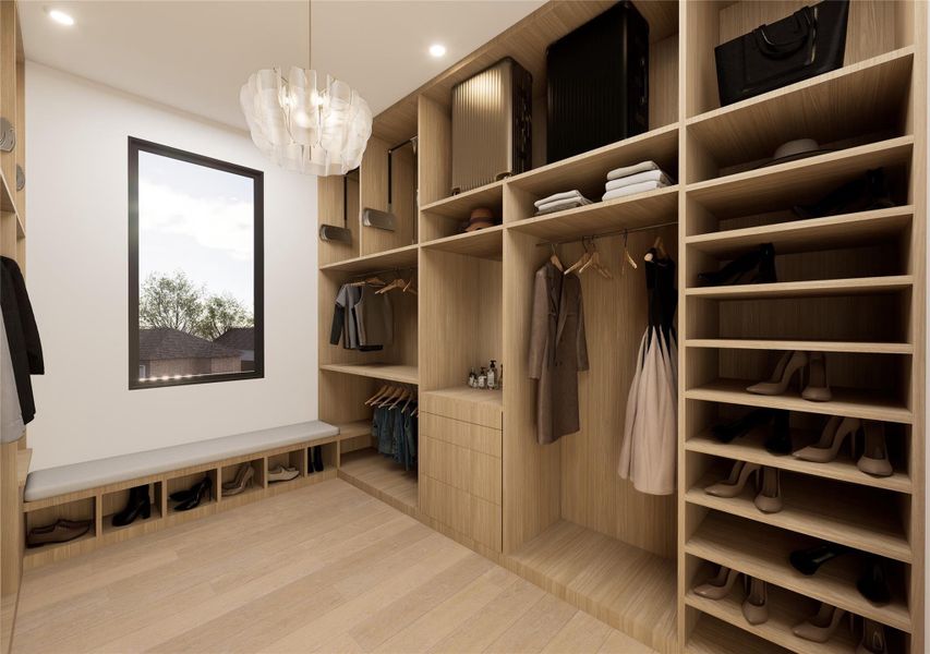 Thoughtfully designed with boutique-level detail, this walk-in closet pairs warm wood finishes with integrated drawers, hanging sections, and curated storage throughout. Natural light streams in, creating a bright, elevated space to start and end your day. Thoughtfully designed with boutique-level detail, this walk-in closet pairs warm wood finishes with integrated drawers, hanging sections, and curated storage throughout. Natural light streams in, creating a bright, elevated space to start and end your day.