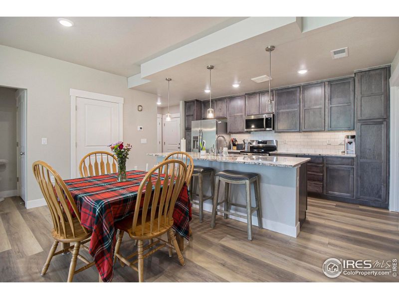 Furnished interior view inside a new home in Highlands at Fox Hill - The Flats, Longmont (Image 9). Furnished interior view inside a new home in Highlands at Fox Hill - The Flats, Longmont (Image 9).