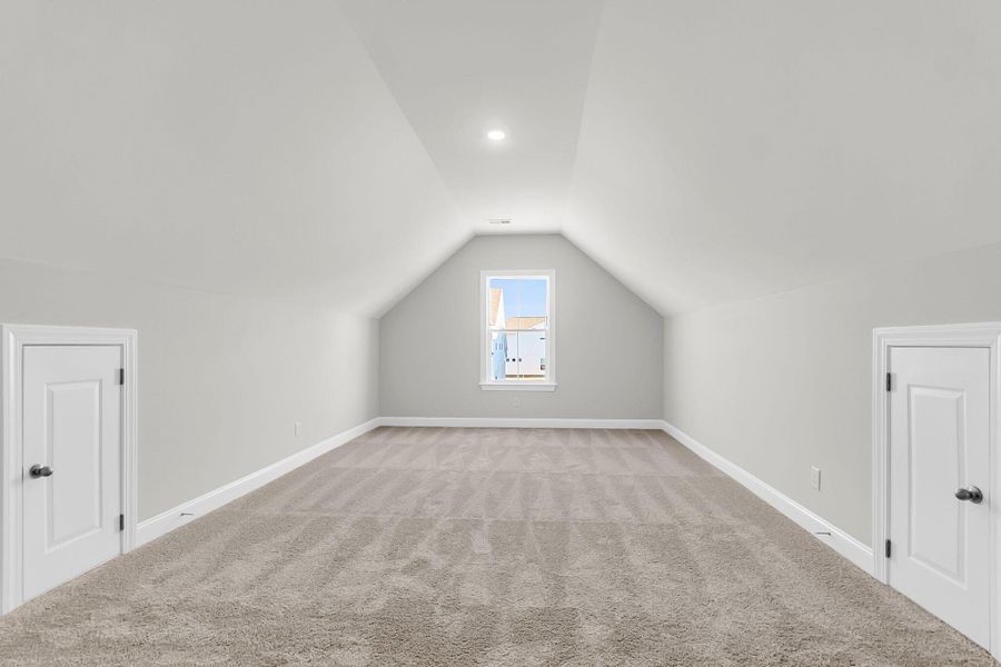 Spacious, unfurnished interior of a new home in Tidewater at Lakes of Cane Bay, Summerville (Image 41).