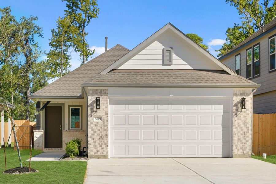 Front exterior of a new home in Cypresswood Landing, Humble, TX, highlighting curb appeal (Image 2).