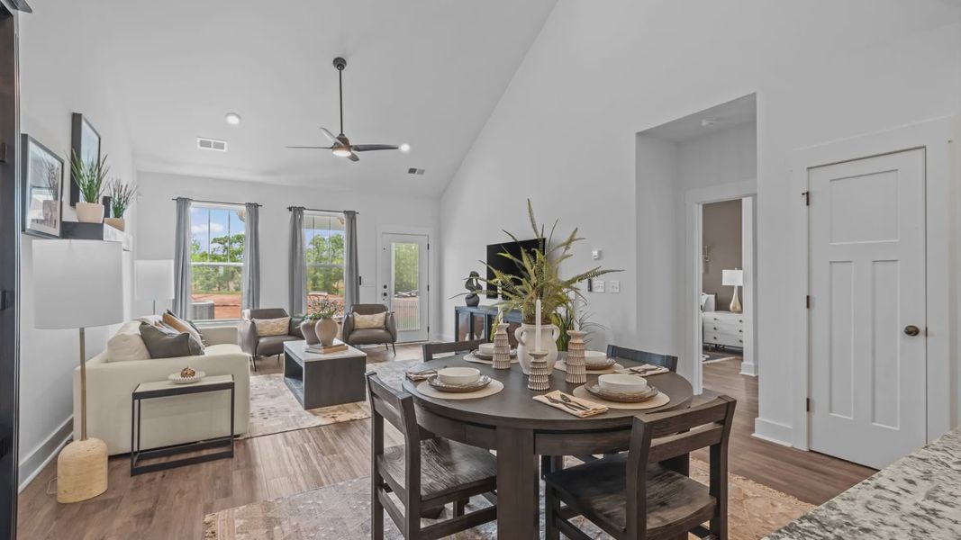 Tasteful dining area with current design in this vibrant two-story villa near Downtown Fountain Inn