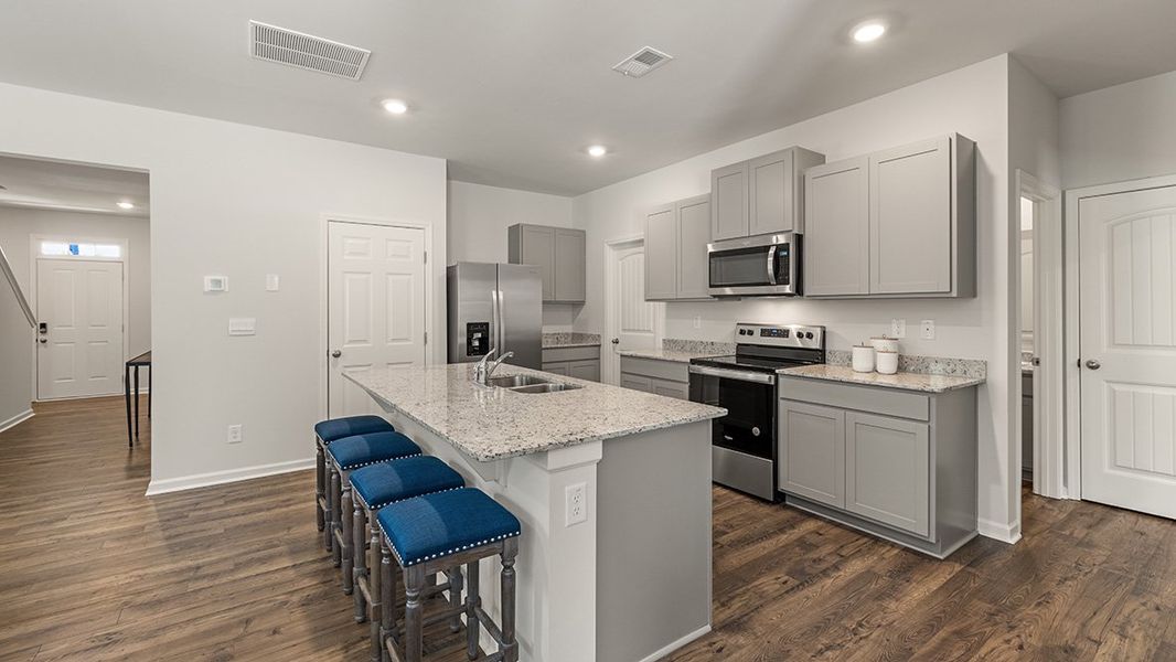 Representative furnished interior of a home built from the ROBIE by D.R. Horton in Pointe Park, Union City (Image 9).