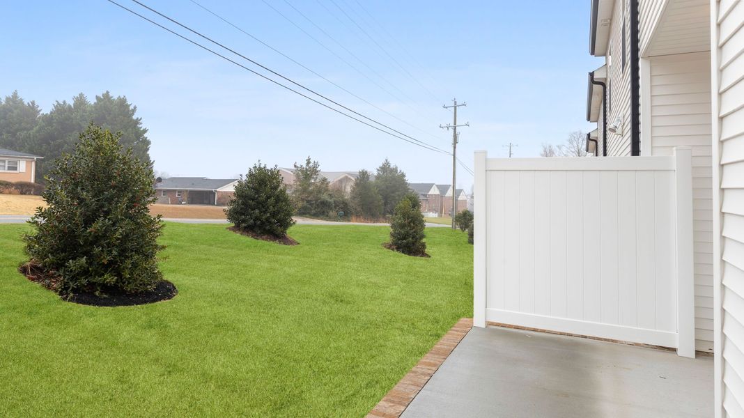 Exterior details and patio area of a home in Pearson Road Townhomes, Easley (Image 21).