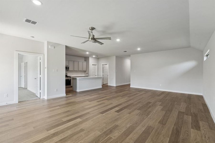 Open Floor Plan in the Oscar home plan by Trophy Signature Homes – REPRESENTATIVE PHOTO