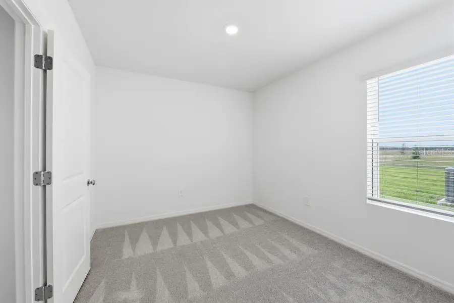 Spacious, unfurnished interior of a new home in Firethorn, Parrish (Image 16).