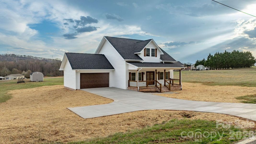Front exterior of a new home in , Taylorsville, NC, highlighting curb appeal (Image 17). Front exterior of a new home in , Taylorsville, NC, highlighting curb appeal (Image 17).
