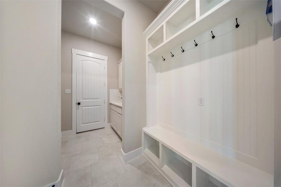 Mudroom with baseboards and recessed lighting Mudroom with baseboards and recessed lighting