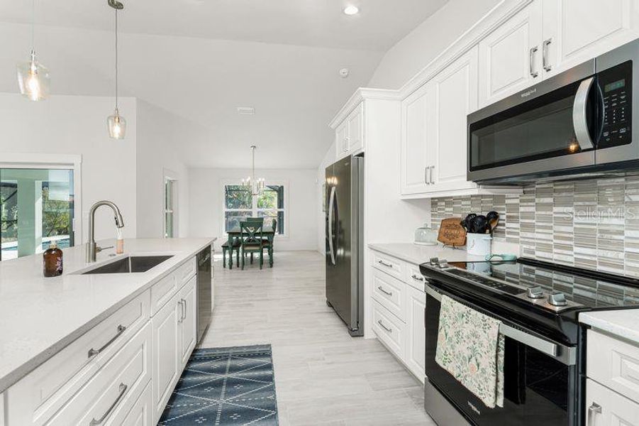 Furnished interior view inside a new home in , Port Charlotte (Image 32).