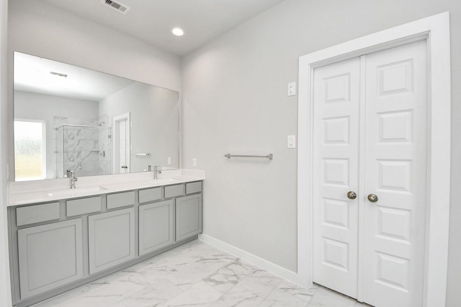 Experience a spa-like escape right in the heart of your primary bathroom! Sample photo of completed home with similar floor plan. Actual colors and selections may vary. Experience a spa-like escape right in the heart of your primary bathroom! Sample photo of completed home with similar floor plan. Actual colors and selections may vary.