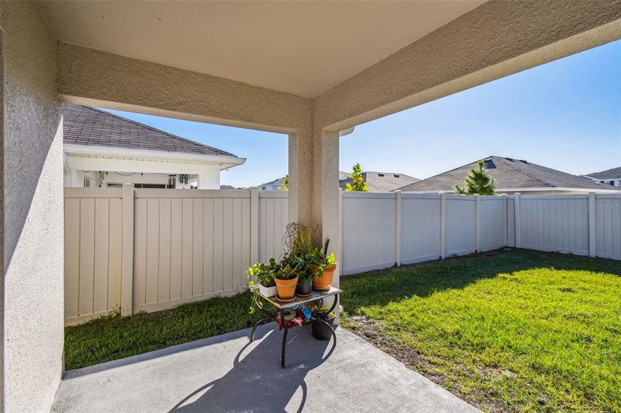 Exterior details and patio area of a home in River Park, Temple Terrace (Image 28).
