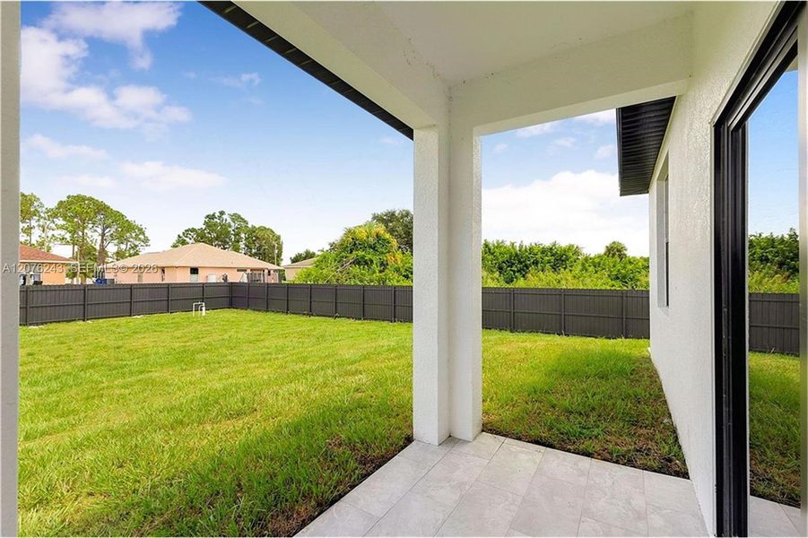 Exterior details and patio area of a home in , Lehigh Acres (Image 24).