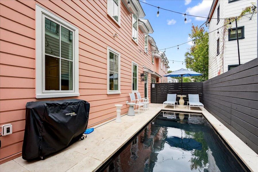 Exterior details and patio area of a home in , Charleston (Image 21).