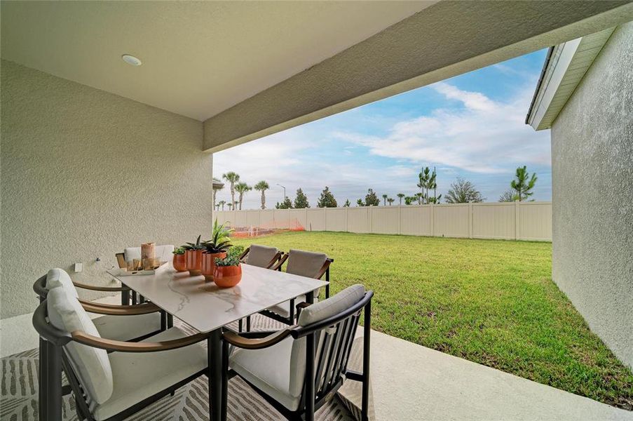 Exterior details and patio area of a home in Oakfield, Parrish (Image 27).
