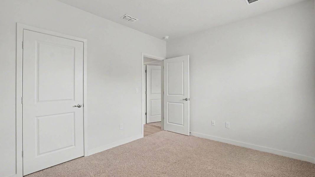 Spacious, unfurnished interior of a new home in Venetian Grove, Vero Beach (Image 19).