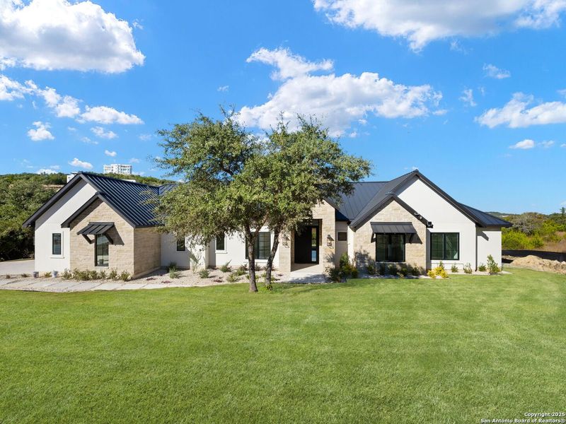 Front exterior of a new home in , San Antonio, TX, highlighting curb appeal (Image 2). Front exterior of a new home in , San Antonio, TX, highlighting curb appeal (Image 2).