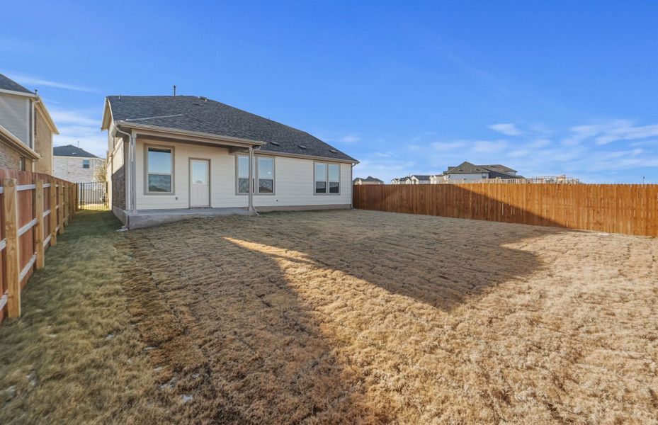 Exterior details and patio area of a home in Saddleback at Santa Rita Ranch, Liberty Hill (Image 29).