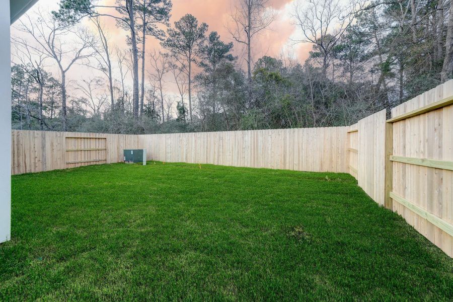 Exterior details and patio area of a home in Creekside Court, Magnolia (Image 3). Exterior details and patio area of a home in Creekside Court, Magnolia (Image 3).