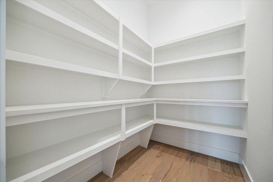 Spacious, unfurnished interior of a new home in Sienna - Estates at Summerhouse Lake, Missouri City (Image 17).