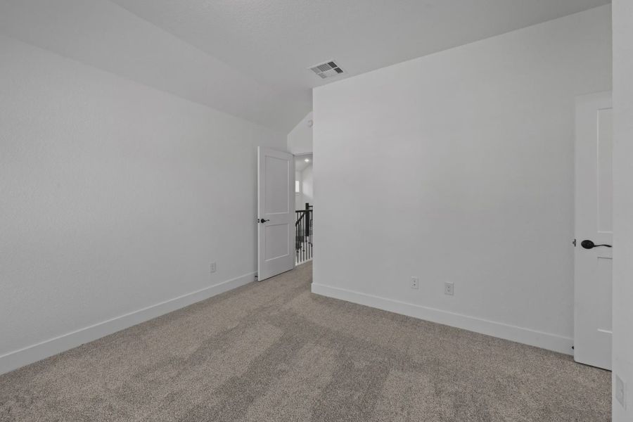 Representative unfurnished interior of a home built from the San Francisco by Chesmar Homes in The Woodlands Hills, Willis (Image 39). Representative unfurnished interior of a home built from the San Francisco by Chesmar Homes in The Woodlands Hills, Willis (Image 39).