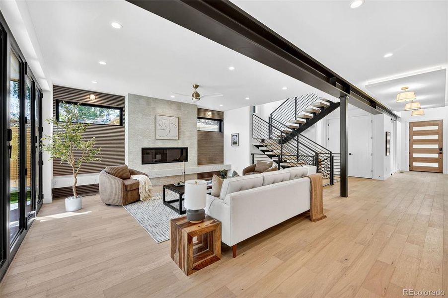 Airy living room with accordion style glass doors