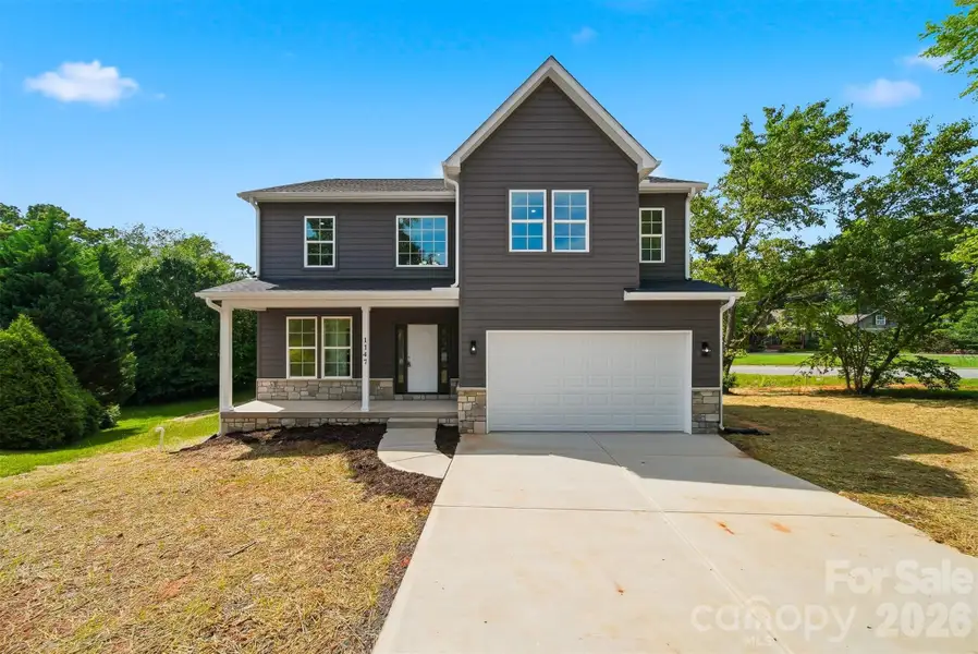 Front exterior of a new home in , Hickory, NC, highlighting curb appeal (Image 23).