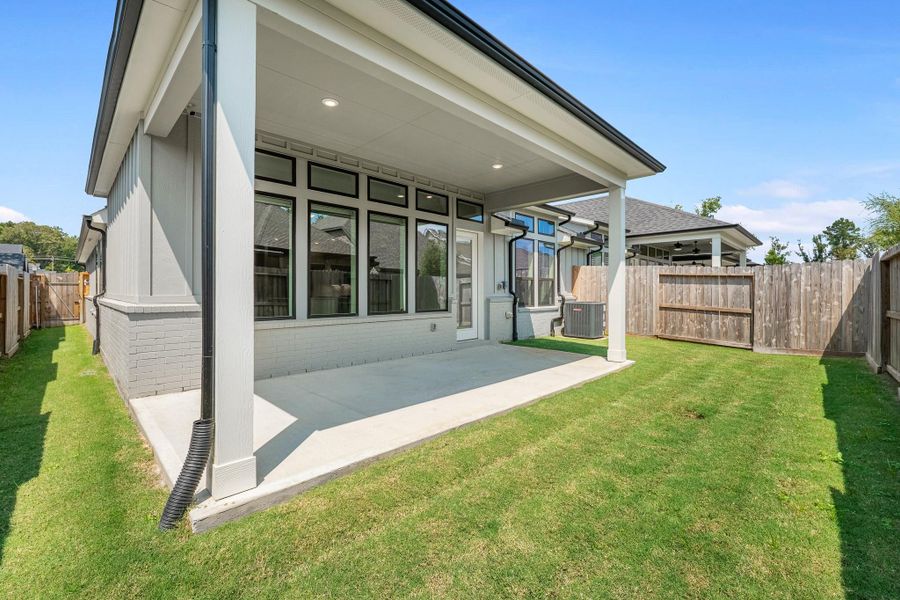 Covered patio and fenced yard Covered patio and fenced yard