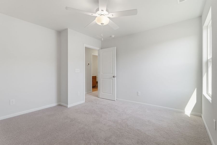 Spacious, unfurnished interior of a new home in Piper Creek, Newton (Image 29).