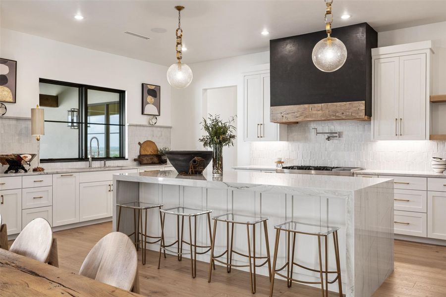 Optional To Be Built - Culinary excellence awaits in this chef's dream, featuring a grand island and premium finishes.