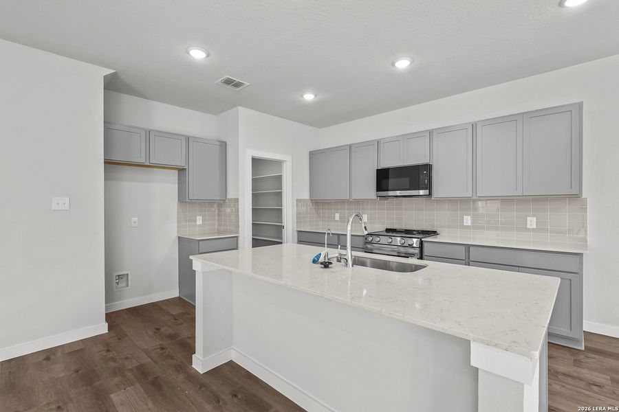 Furnished interior view inside a new home in Agave, San Antonio (Image 6).