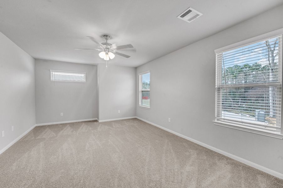 Representative unfurnished interior of a home built from the Floor Plan 1774 by Colina Homes in Rollingbrook Estates, Baytown (Image 18).