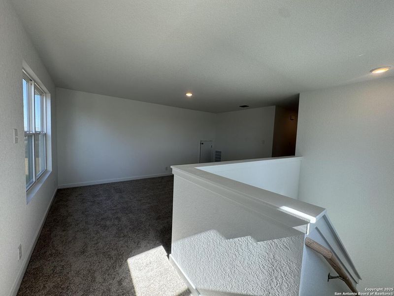 Spacious, unfurnished interior of a new home in Enclave at Hennersby Hollow 50's, San Antonio (Image 22).