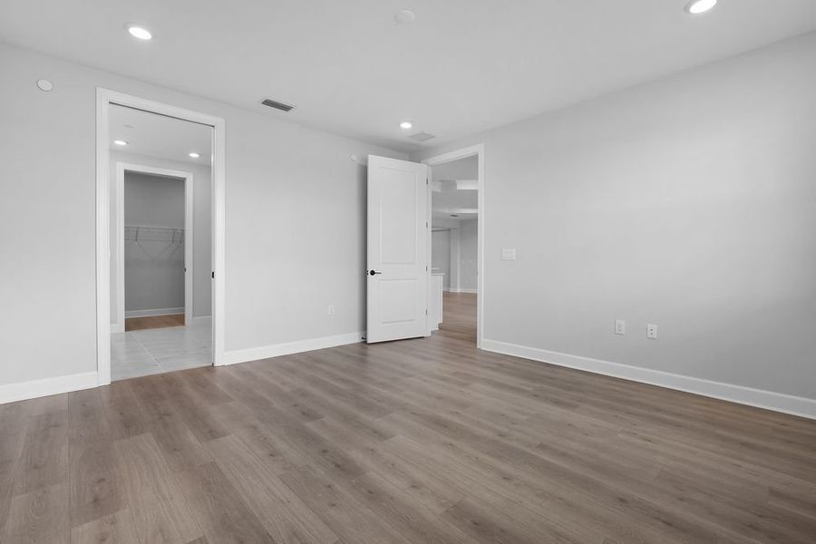 Spacious, unfurnished interior of a new home in Esplanade by the Islands Coach Homes, Naples (Image 13).