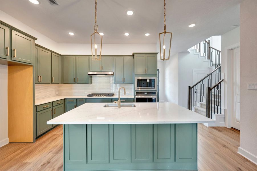 Furnished interior view inside a new home in Sienna - Landmark Row Collection, Missouri City (Image 6).