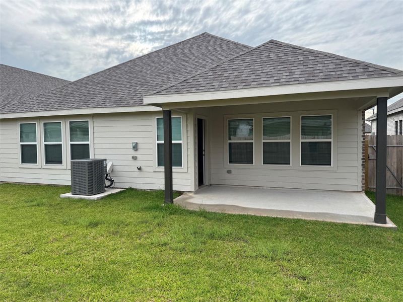 Covered back patio creates the ideal space for outdoor dining and relaxing evenings. Covered back patio creates the ideal space for outdoor dining and relaxing evenings.