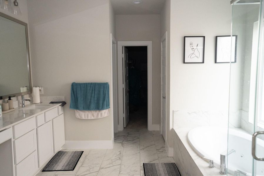 Furnished interior view inside a new home in Sunterra, Katy (Image 41).