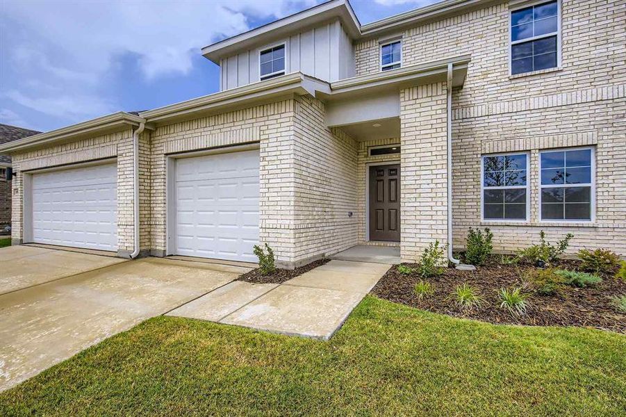 Exterior details and patio area of a home in Prestige Collection at Overland Grove, Forney (Image 14).