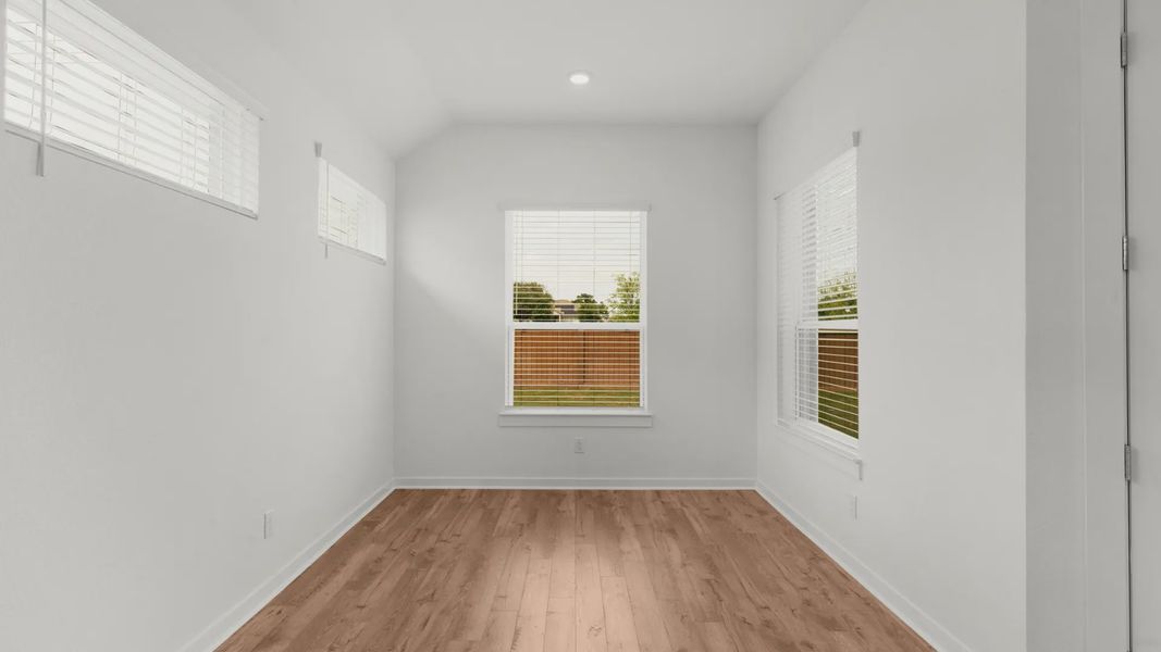 Representative unfurnished interior of a home built from the Bryson by Chesmar Homes in Newhaven, Manor (Image 14).