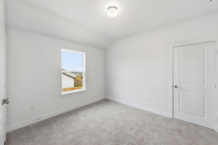 Spacious, unfurnished interior of a new home in The Colony, Bastrop (Image 40).