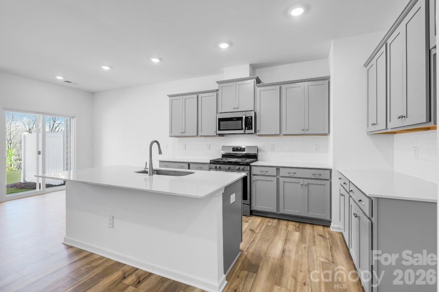 Furnished interior view inside a new home in Cannon Village, York (Image 4).