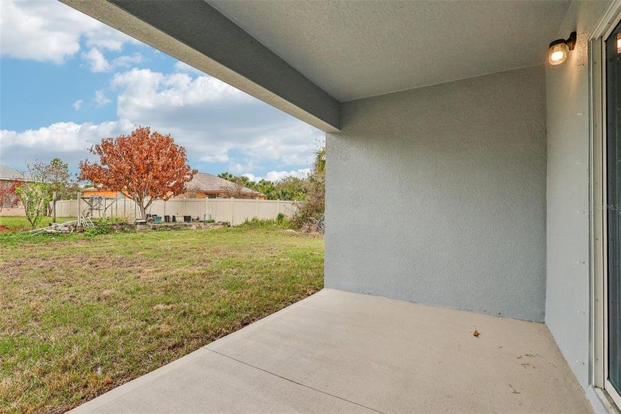 Exterior details and patio area of a home in Palm Bay Classic, Palm Bay (Image 3).