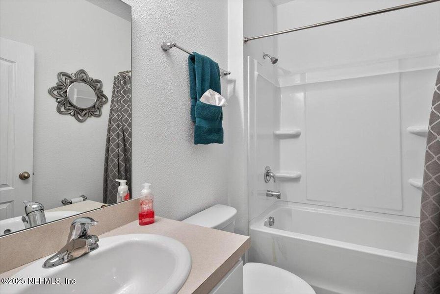 Furnished interior view inside a new home in River Glen Express, Yulee (Image 12).