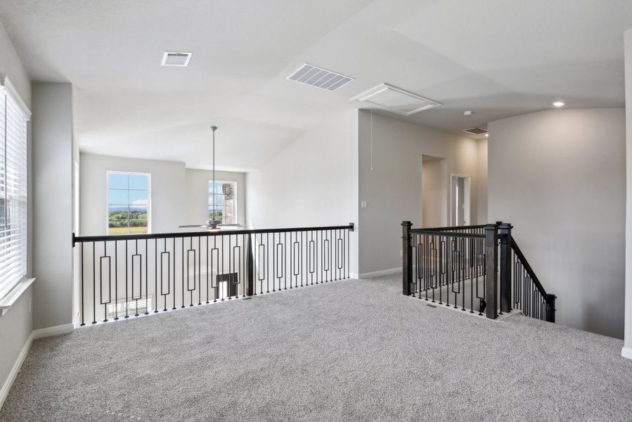 Second floor landing in the Medina floorplan at a Meritage Homes community.