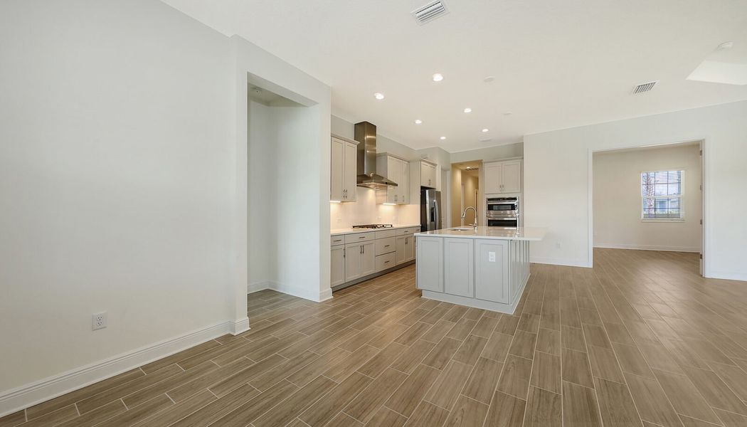 Spacious, unfurnished interior of a new home in Wildleaf at North River Ranch, Parrish (Image 22).